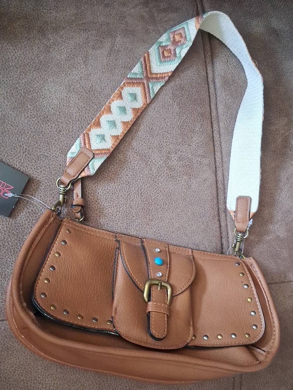 No Boundaries Tan Faux Leather Crossbody Bag with Woven Guitar Style Strap